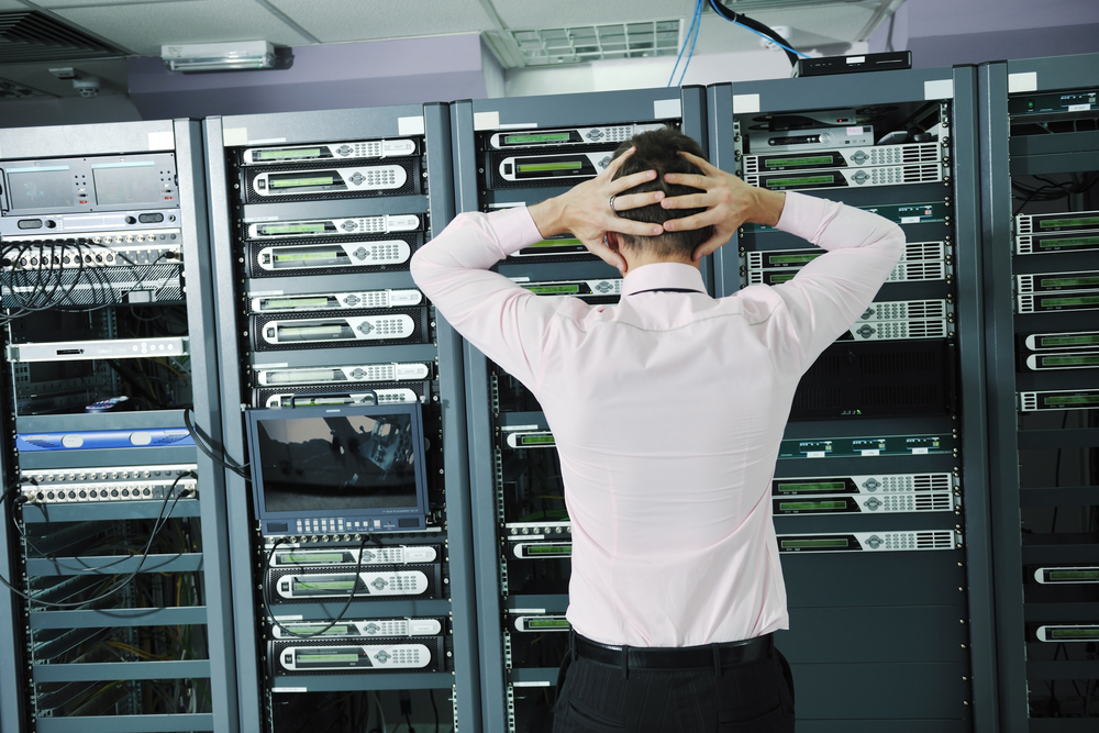 it business man in network server room have problems and looking for disaster situation solution-1 it business man in network server room have problems and looking for disaster situation solution-1